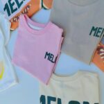 5 REMERAS DE NENA OVERSIZE MELON